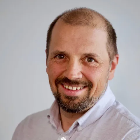 Portrett av John W. Nilsen fra FARMAR